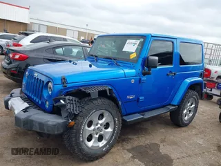 2015 Jeep Wrangler Sahara with VIN 1C4AJWBG9FL663959, listed as a IAAI auction lot 42133900 with 56,253 mi miles and . Bid and sale history available at DreamBid. Image 15.