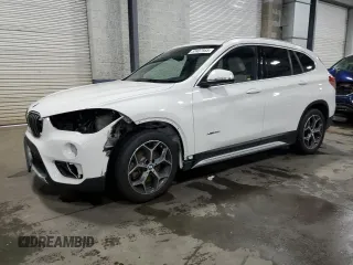 2017 BMW X1 xDrive28i with VIN WBXHT3Z36H4A65082, listed as a Copart auction lot 57407955 with 63,346 mi miles and Salvage title. Bid and sale history available at DreamBid. Image 1.
