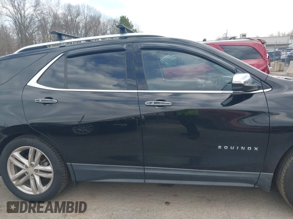 2018 Chevrolet Equinox Premier with VIN 2GNAXWEX6J6302935, listed as a IAAI auction lot 42065883 with 61,983 mi miles and . Bid and sale history available at carsss.com. Image 13.