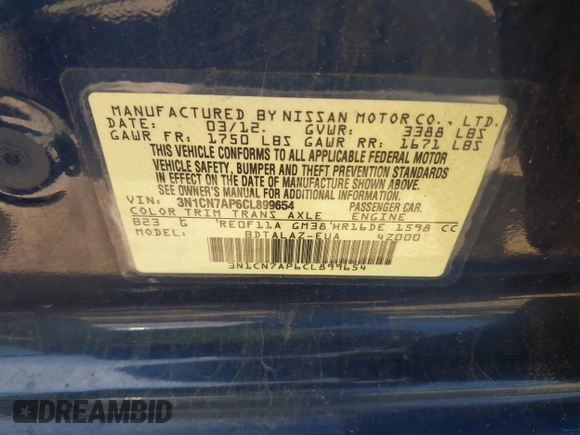 2012 Nissan Versa SV with VIN 3N1CN7AP6CL899654, listed as a IAAI auction lot 42166459 with 121,062 mi miles. Bid and sale history available at carsss.com. Image 9.