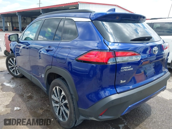 2023 Toyota Corolla Cross XLE with VIN 7MUEAAAG7PV065106, listed as a IAAI auction lot 42168195 with 6,519 mi miles and . Bid and sale history available at DreamBid. Image 3.