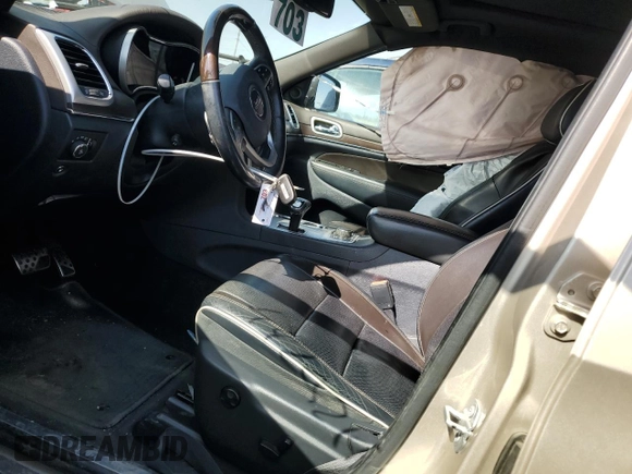 2015 Jeep Grand Cherokee Overland with VIN 1C4RJFCG9FC681699, listed as a Copart auction lot 49292195 with 144,133 mi miles and Clean Title. Bid and sale history available at carsss.com. Image 7.