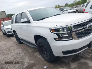 2016 Chevrolet Tahoe Commercial z VIN 1GNLCDECXGR137331, wystawiony jako IAAI lot #41874861 z przebiegiem 167 768 mil mil oraz . Historia ofert i sprzedaży dostępna na DreamBid. Obrazek 1.