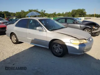 2001 Honda Accord EX z VIN 1HGCG16531A063589, wystawiony jako Copart lot #57875015 z przebiegiem Nie podano mil oraz Szkoda całkowita • Salvage title. Historia ofert i sprzedaży dostępna na DreamBid. Obrazek 4.