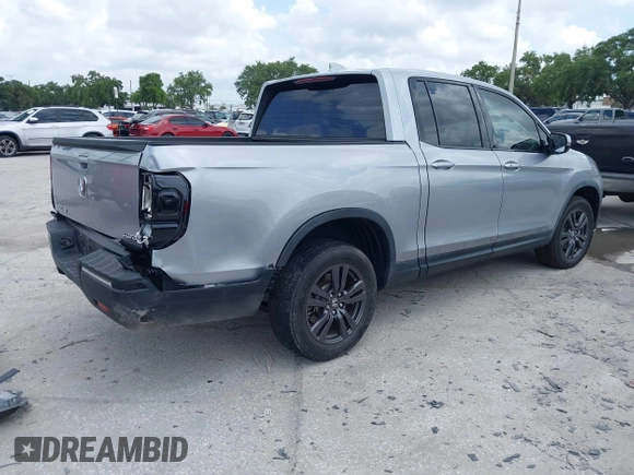 2020 Honda Ridgeline Sport with VIN 5FPYK3F19LB024180, listed as a IAAI auction lot 42399195 with 42,129 mi miles and . Bid and sale history available at DreamBid. Image 4.