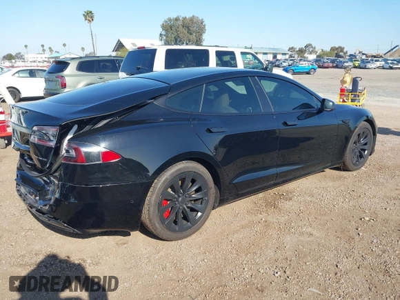 2020 Tesla Model S Long Range with VIN 5YJSA1E24LF381878, listed as a IAAI auction lot 41965340 with 47,468 mi miles. Bid and sale history available at carsss.com. Image 4.