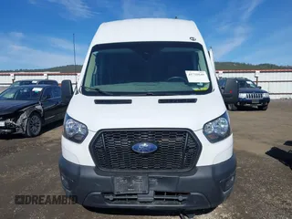 2023 Ford Transit Cargo with VIN 1FTBR2X84PKB37947, listed as a IAAI auction lot 41750849 with 58,114 mi miles and . Bid and sale history available at DreamBid. Image 12.
