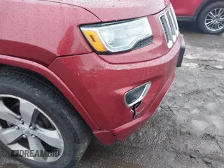 2014 Jeep Grand Cherokee Overland with VIN 1C4RJFCG9EC299235, listed as a IAAI auction lot 41670065 with 108,589 mi miles and . Bid and sale history available at DreamBid. Image 19.
