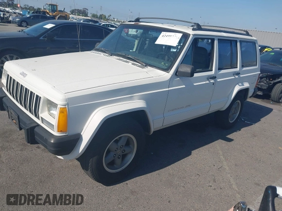 1996 Jeep Cherokee Sport with VIN 1J4FT68S7TL265733, listed as a IAAI auction lot 42499228 with 230,001 mi miles and . Bid and sale history available at DreamBid. Image 2.