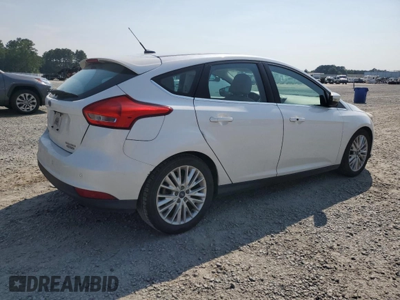 2015 Ford Focus Titanium с VIN 1FADP3N24FL214429, выставлен на аукционе Copart как лот 59159075 с пробегом 157 353 миль миль и Списание • Salvage title. История ставок и продаж доступна на DreamBid. Изображение 3.