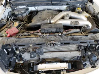2014 Ford F-150 XL with VIN 1FTFW1ETXEFB39719, listed as a Copart auction lot 62073335 with 124,643 mi miles and Salvage title. Bid and sale history available at DreamBid. Image 11.