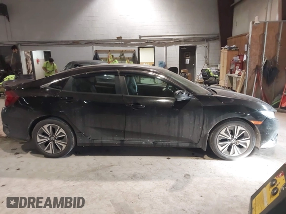 2016 Honda Civic Sedan EX-L with VIN 19XFC1F75GE210803, listed as a IAAI auction lot 41424370 with 111,848 mi miles. Bid and sale history available at carsss.com. Image 13.