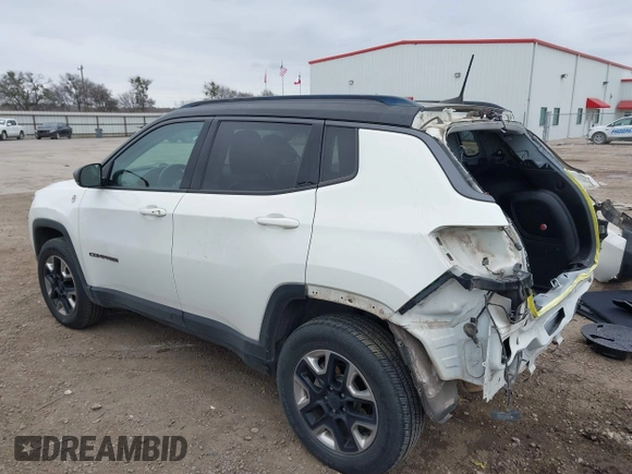 2018 Jeep Compass Trailhawk with VIN 3C4NJDDB7JT144431, listed as a IAAI auction lot 41629703 with 122,079 mi miles and . Bid and sale history available at carsss.com. Image 3.