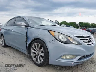2012 Hyundai Sonata Limited z VIN 5NPEC4AB5CH402785, wystawiony jako IAAI lot #42350650 z przebiegiem 145 648 mil mil oraz . Historia ofert i sprzedaży dostępna na DreamBid. Obrazek 6.