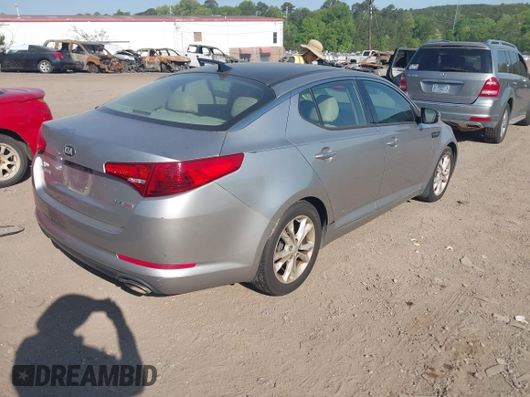 2013 Kia Optima EX z VIN 5XXGN4A76DG200422, wystawiony jako IAAI lot #42067904 z przebiegiem 278 808 mil mil oraz . Historia ofert i sprzedaży dostępna na DreamBid. Obrazek 4.
