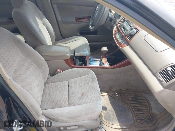 2003 Toyota Camry LE with VIN 4T1BE30K33U243758, listed as a IAAI auction lot 42169032 with 260,336 mi miles and . Bid and sale history available at DreamBid. Image 5.