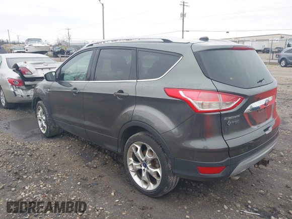2015 Ford Escape Titanium with VIN 1FMCU9J94FUB49236, listed as a IAAI auction lot 42117378 with 112,267 mi miles. Bid and sale history available at carsss.com. Image 3.