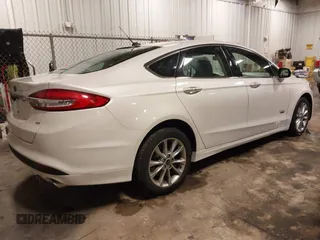 2018 Ford Fusion Energi SE with VIN 3FA6P0PU9JR264257, listed as a IAAI auction lot 41587659 with 85,832 mi miles. Bid and sale history available at carsss.com. Image 4.