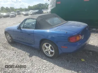 1999 Mazda MX-5 Miata with VIN JM1NB353XX0134898, listed as a Copart auction lot 63429475 with 140,595 mi miles and Clean title. Bid and sale history available at DreamBid. Image 2.