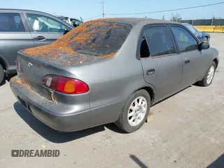 1999 Toyota Corolla VE z VIN 1NXBR12E5XZ237045, wystawiony jako IAAI lot #42413586 z przebiegiem Nie podano mil oraz . Historia ofert i sprzedaży dostępna na DreamBid. Obrazek 4.