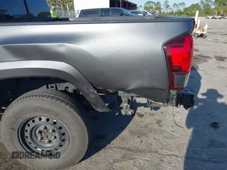 2018 Toyota Tacoma SR5 with VIN 3TMAZ5CN4JM069965, listed as a IAAI auction lot 41798238 with 124,619 mi miles and . Bid and sale history available at DreamBid. Image 6.