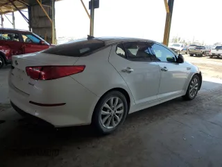 2014 Kia Optima EX z VIN 5XXGN4A71EG275210, wystawiony jako Copart lot #58095515 z przebiegiem 113 030 mil mil oraz Szkoda całkowita • Salvage title. Historia ofert i sprzedaży dostępna na DreamBid. Obrazek 3.