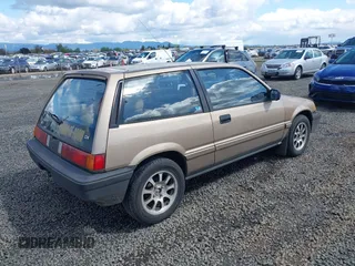 1986 Honda Civic z VIN JHMAH5325GS018658, wystawiony jako IAAI lot #41946339 z przebiegiem 69 518 mil mil oraz . Historia ofert i sprzedaży dostępna na DreamBid. Obrazek 4.