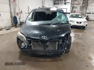 2011 Toyota Sienna SE with VIN 5TDXK3DC1BS172813, listed as a IAAI auction lot 41643352 with 172,385 mi miles. Bid and sale history available at carsss.com. Image 13.