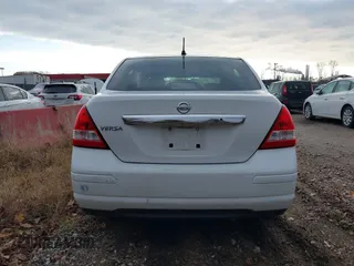 2009 Nissan Versa 1.8 S with VIN 3N1BC11E49L416720, listed as a IAAI auction lot 40960069 with 130,131 mi miles. Bid and sale history available at carsss.com. Image 16.