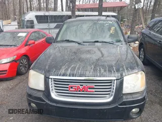 2006 GMC Envoy SLT with VIN 1GKDS13S562199496, listed as a IAAI auction lot 41463065 with 219,473 mi miles. Bid and sale history available at carsss.com. Image 6.