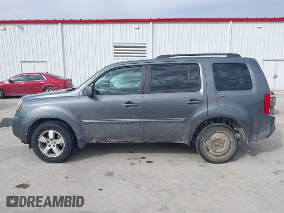 2011 Honda Pilot EX-L with VIN 5FNYF4H59BB042308, listed as a IAAI auction lot 41635511 with 196,736 mi miles and . Bid and sale history available at carsss.com. Image 14.