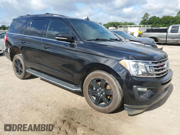 2021 Ford Expedition XLT with VIN 1FMJU1HT9MEA32186, listed as a Copart auction lot 59351615 with 109,205 mi miles and Salvage title. Bid and sale history available at DreamBid. Image 4.