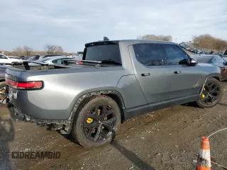 2022 Rivian R1T Adventure Package with VIN 7FCTGAAAXNN005667, listed as a Copart auction lot 44321435 with 48,249 mi miles and Salvage Title. Bid and sale history available at carsss.com. Image 3.