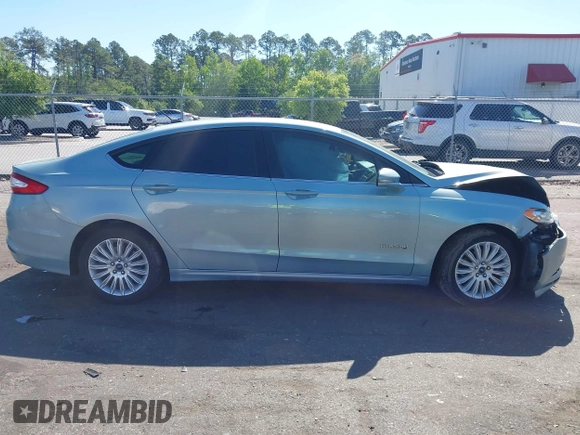 2014 Ford Fusion SE Hybrid with VIN 3FA6P0LU3ER373311, listed as a IAAI auction lot 42048513 with 155,935 mi miles. Bid and sale history available at carsss.com. Image 13.