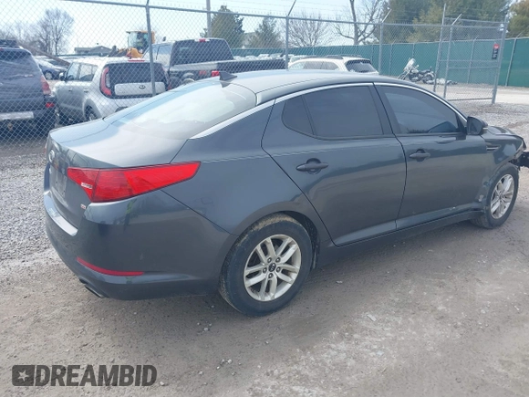 2011 Kia Optima LX z VIN KNAGM4A73B5166988, wystawiony jako IAAI lot #41689192 z przebiegiem 149 123 mil mil oraz . Historia ofert i sprzedaży dostępna na DreamBid. Obrazek 4.