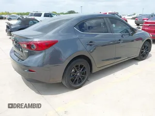 2014 Mazda 3 i Touring z VIN JM1BM1V75E1153967, wystawiony jako IAAI lot #42043936 z przebiegiem 147 580 mil mil oraz . Historia ofert i sprzedaży dostępna na DreamBid. Obrazek 4.