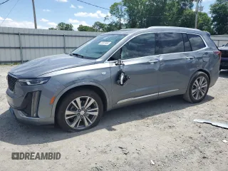 2022 Cadillac XT6 Premium Luxury с VIN 1GYKPCRSXNZ106107, выставлен на аукционе Copart как лот 55597655 с пробегом 75 714 миль миль и Списание • Salvage title. История ставок и продаж доступна на DreamBid. Изображение 1.