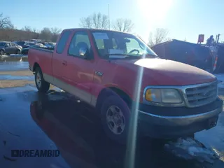 2000 Ford F-150 XL with VIN 1FTZX1724YKB03258, listed as a IAAI auction lot 41356935 with 208,570 mi miles. Bid and sale history available at carsss.com. Image 1.