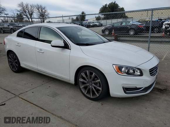 2015 Volvo S60 T5 Drive-E Platinum with VIN YV140MFD7F2301858, listed as a Copart auction lot 44586105 with 50,575 mi miles and Salvage Title. Bid and sale history available at carsss.com. Image 4.