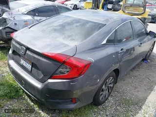 2016 Honda Civic Sedan EX with VIN 2HGFC2F75GH534331, listed as a IAAI auction lot 41866923 with 141,109 mi miles. Bid and sale history available at carsss.com. Image 4.