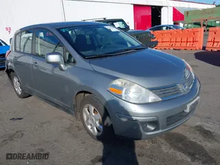 2009 Nissan Versa 1.8 S with VIN 3N1BC13E19L412248, listed as a IAAI auction lot 41669186 with 137,460 mi miles. Bid and sale history available at carsss.com. Image 1.