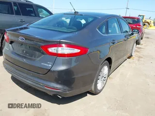 2016 Ford Fusion SE Hybrid with VIN 3FA6P0LU9GR405097, listed as a IAAI auction lot 42000535 with 58,293 mi miles. Bid and sale history available at carsss.com. Image 4.