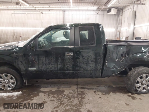 2014 Ford F-150 XL with VIN 1FTFX1ET8EKE32412, listed as a IAAI auction lot 41557331 with 128,744 mi miles. Bid and sale history available at carsss.com. Image 15.