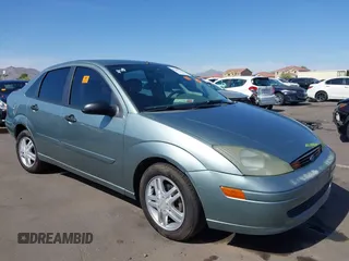 2003 Ford Focus SE z VIN 1FAFP34P53W162793, wystawiony jako IAAI lot #42385636 z przebiegiem Nie podano mil oraz . Historia ofert i sprzedaży dostępna na DreamBid. Obrazek 1.