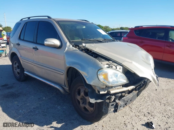 2003 Mercedes-Benz M-Class 3.7L with VIN 4JGAB57E23A453057, listed as a IAAI auction lot 41704721 with 190,649 mi miles. Bid and sale history available at carsss.com. Image 1.