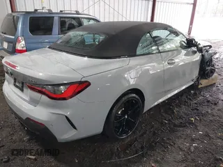 2024 BMW 4 Series 430i xDrive with VIN WBA43AT00RCN83317, listed as a IAAI auction lot 41211849 with 12,000 mi miles and . Bid and sale history available at DreamBid. Image 4.