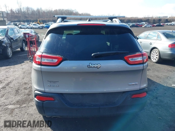 2014 Jeep Cherokee Altitude with VIN 1C4PJMCB5EW167961, listed as a IAAI auction lot 41660440 with 88,705 mi miles and . Bid and sale history available at DreamBid. Image 16.