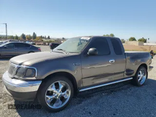 2003 Ford F-150 XL with VIN 1FTRX07233KC40260, listed as a Copart auction lot 78007404 with 85,222 mi miles and Salvage title. Bid and sale history available at DreamBid. Image 1.