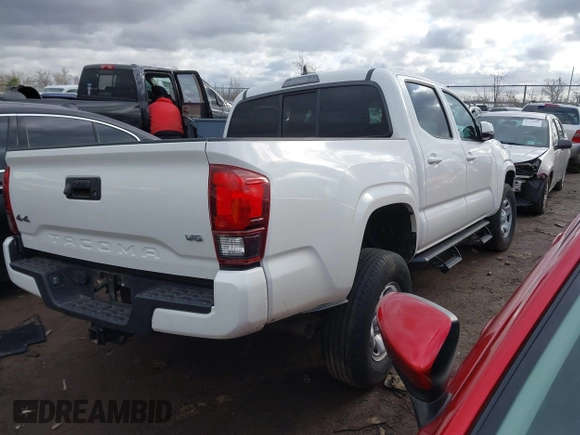 2022 Toyota Tacoma SR with VIN 3TMCZ5ANXNM457736, listed as a IAAI auction lot 41708016 with 44,351 mi miles and . Bid and sale history available at DreamBid. Image 4.