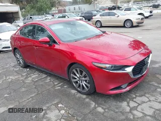 2021 Mazda 3 with VIN JM1BPBDL6M1305765, listed as a IAAI auction lot 42063684 with 61,011 mi miles and . Bid and sale history available at DreamBid. Image 1.